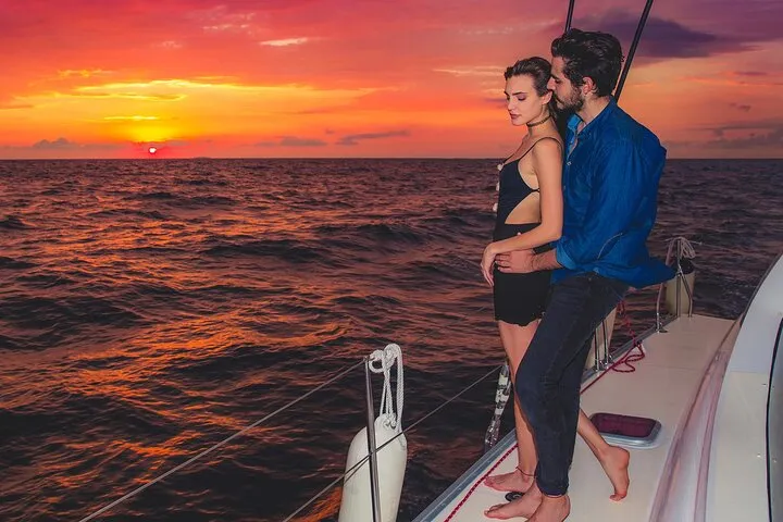 Sailboat at sunset on a Cancun yacht rental style sunset sailing cruise, Quintana Roo, Mexico
