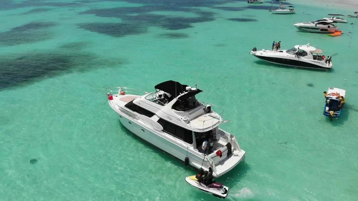 Carver 55-foot yacht on a Cancun yacht rental with food and drinks near Isla Mujeres, Quintana Roo, Mexico